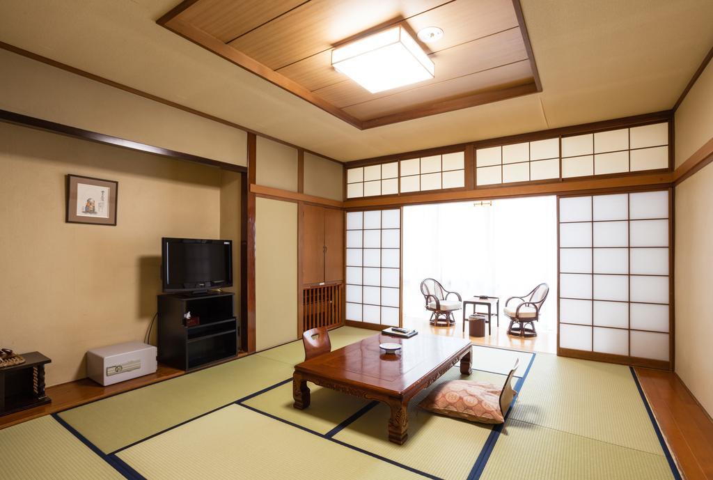 Hotel Mikunitoge Onsen Oyado Honjin à Yuzawa  Extérieur photo